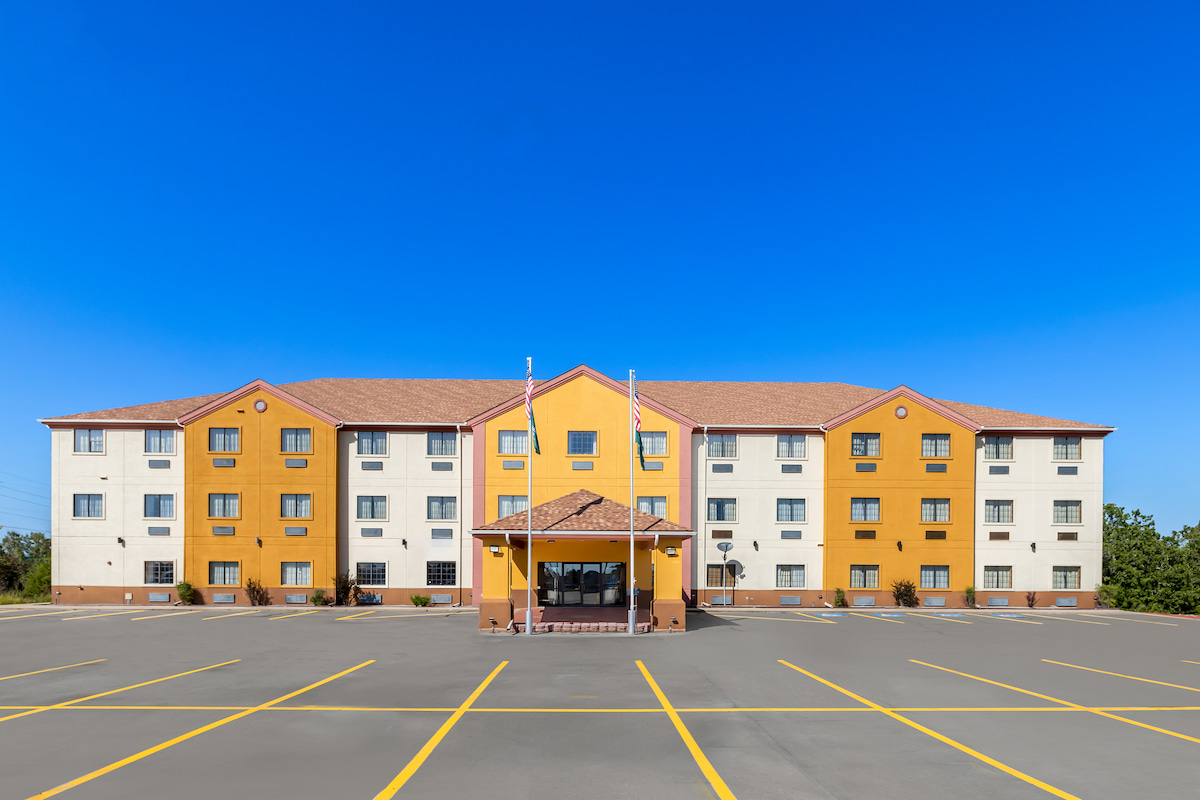 Exterior front view of Quality Inn & Suites McAlester on Hwy 69