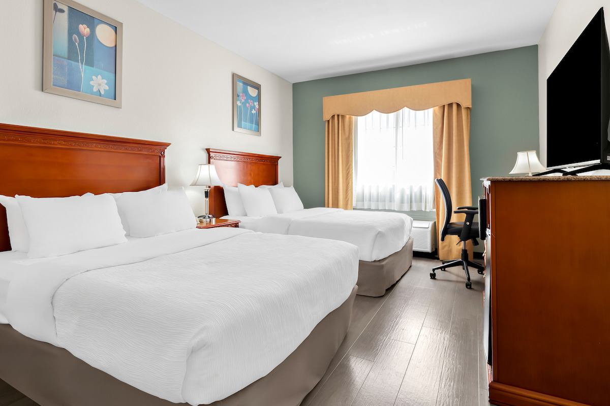 Double queen room at Quality Inn & Suites McAlester on Hwy 69