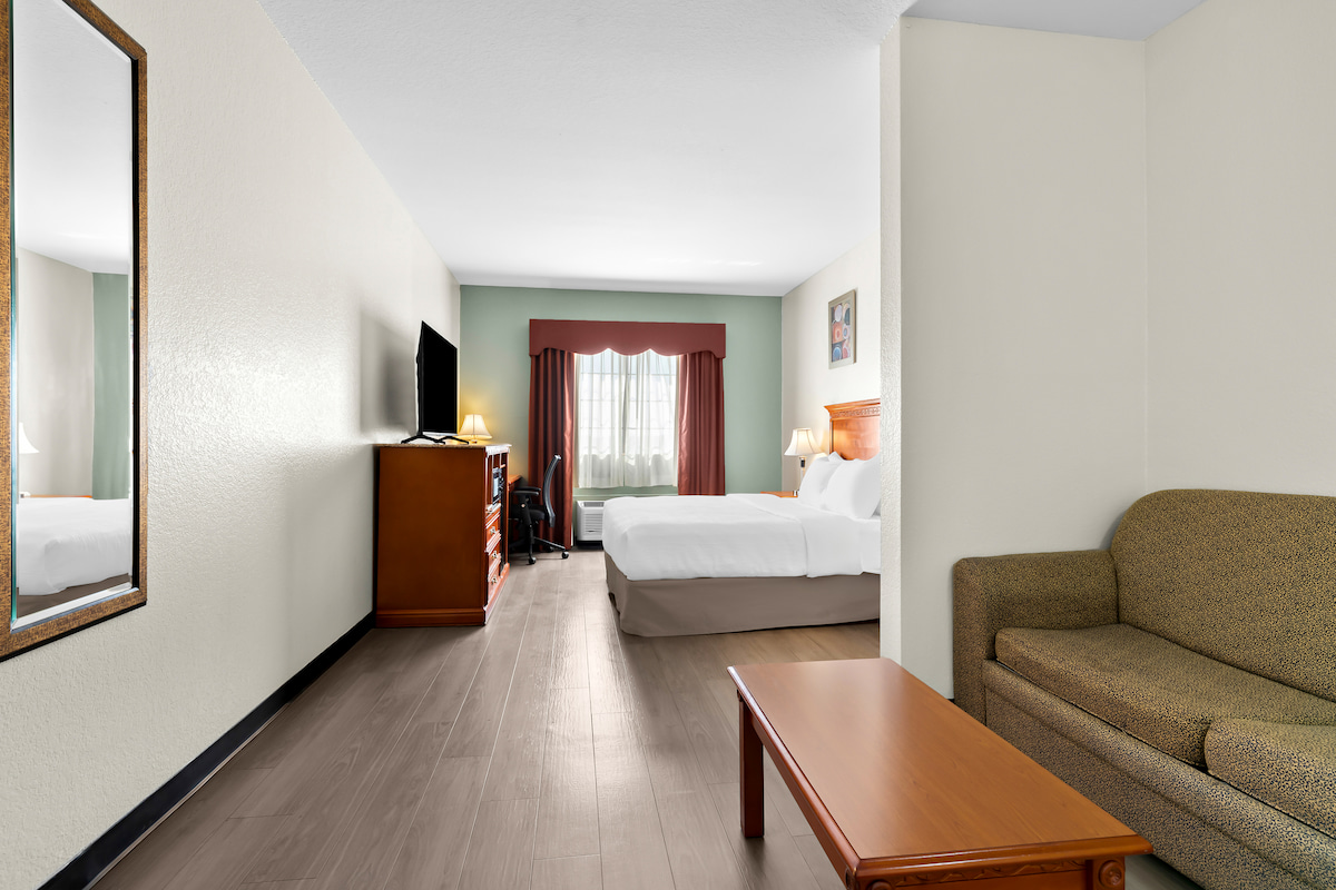 King room with sofa at Quality Inn & Suites McAlester on Hwy 69